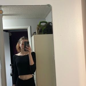 Black medium crop top, with laced back.